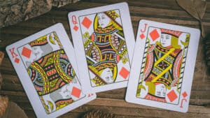 Playing cards featuring intricate, colorful designs inspired by Floria MegaJam.