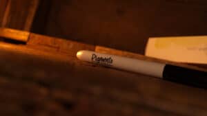 Close-up of a white marker labeled 