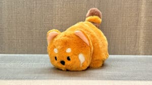 Plush toy transforming from a panda to a raccoon, demonstrating magical plush tricks.