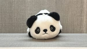 Soft plush toy transforming from panda to blue penguin, magic trick by Jackie Zhao and JT Magic.
