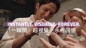 Two performers performing a magic trick during the Anniversary 2.0 The Final Waltz event.