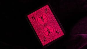 Pink Bicycle Reverse playing cards with intricate design for magic tricks and card illusions.
