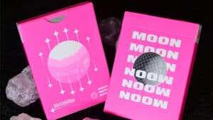 Pink Moon playing cards with celestial design for magic tricks and card illusions.