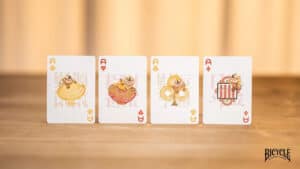 Bicycle mascot playing cards featuring cartoon character designs for magic tricks and card games.