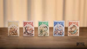 Bicycle mascot playing cards featuring colorful animal illustrations for magic tricks and card games.