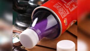 Colorful silk trick with soda bottle for magic illusions.