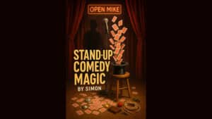 Comedy magic performance with cards and props on stage by Simon.