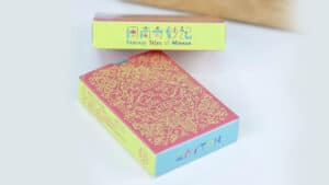 Traditional Minnan playing cards with intricate designs for magic tricks and card illusions.