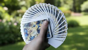 Metropolis playing cards fanned out, showcasing vibrant artwork for magic tricks.