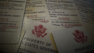 Gemini Files magic trick demonstration with secret documents and props.