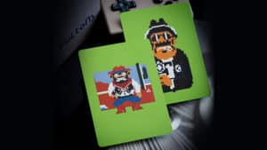 Vintage arcade-themed playing cards featuring pixel art characters from classic video games.