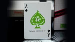 Fulton Arcade Gameboy playing card featuring a spade with green design elements.