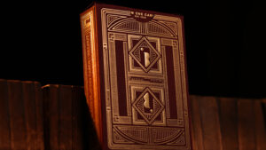 Elegant Walnut Edition of Red Roots magic trick book with intricate geometric cover design.