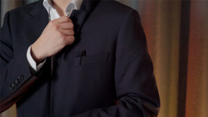 Close-up of a person performing a magic trick with a Sharpie marker.