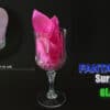 Elegant glass with pink silk fabric for magical illusions and tricks.