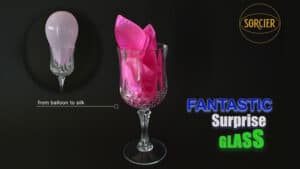 Elegant glass with pink silk fabric for magical illusions and tricks.