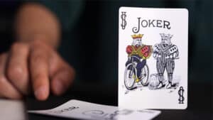 Joker playing card with magician's illusion for magic tricks.