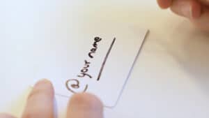 Close-up of a person writing 