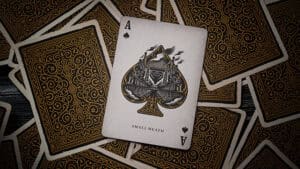 Peaky Blinders themed playing cards with intricate gold and black design for magic tricks and card i.