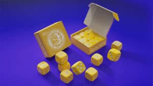 Yellow forcing dice set for magic tricks and mentalism performances. Perfect for illusions and card.