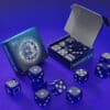 Transparent blue forcing dice set for magic tricks and illusions.