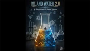 Magical oil and water experiment with colorful liquids in a laboratory flask.