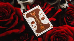 Artistic skull and rose playing card with intricate design for magic tricks.