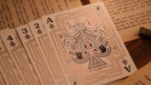 Assassin's Creed Legacy Version 2 Garnet playing cards with hidden black blade design.