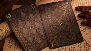 Assassin's Creed Legacy Version 2 Onyx playing cards with hidden blade design.