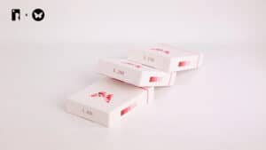 Playing cards stacked with butterfly design for magic tricks and illusions.