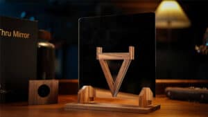 Intriguing mirror illusion featuring a wooden triangle and reflective surface for captivating magic.