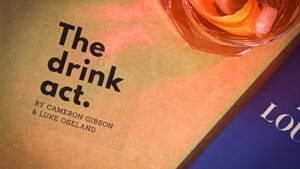 Cover of "The Drink Act" by Luke Oseland & Cameron Gibson featuring a cocktail glass.