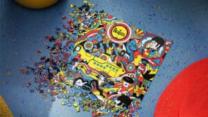 Colorful Yellow Submarine jigsaw puzzle featuring The Beatles artwork for collectors.