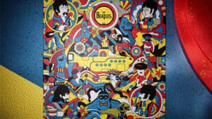 Colorful Beatles Yellow Submarine jigsaw puzzle featuring cartoon characters and vibrant design.