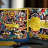 Themed jigsaw puzzle featuring The Beatles' Yellow Submarine design.