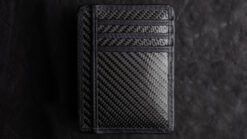 Carbon fiber shadow wallet used for magic tricks and illusions.