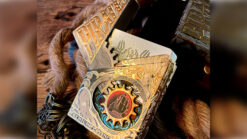 Pirate-themed playing cards with intricate mechanical box for magic tricks and illusions.