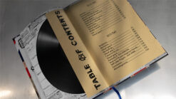 Vintage record album cover with a vinyl record and contents list.