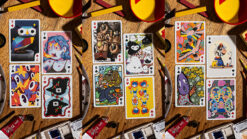 Playing cards featuring colorful, whimsical designs inspired by sari-sari store themes.