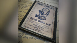 Vintage game box with "The Old Original Game" label and "Happy Families" title.
