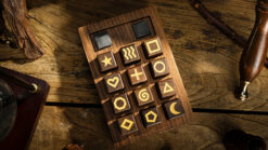 Wooden puzzle blocks with symbols for magic tricks and mentalism performances.