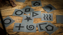 Collection of mysterious symbol cards for magic tricks and illusions.