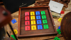 Prophesy Matrix magic trick with colorful numbered blocks for mentalism and prediction effects.