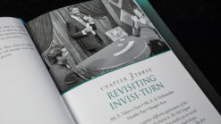 Performer demonstrating a magic trick during a magic lecture or workshop.