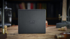 Elegant tiered packet organizer for magic tricks and card storage. Perfect for magicians to organize.