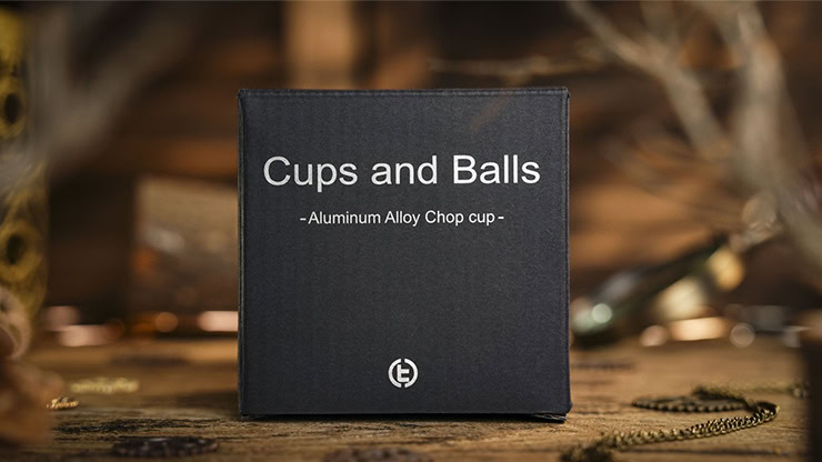 Aluminum alloy cups and balls set with matching chop cup for magic tricks.