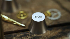 Magic weights game with 50g weight and rings for illusion tricks.