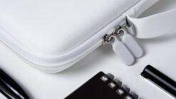 Durable white PITATA carrying case for magic tricks and accessories.