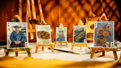 Set of Van Gogh themed playing cards featuring famous artworks, displayed on small easels.