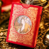 Red Mucha playing cards with Art Nouveau design for magic tricks.